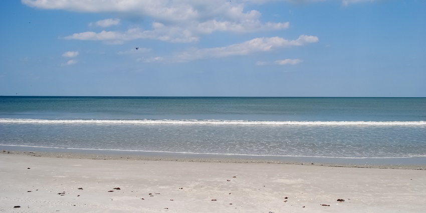 An image showing a view of Cocoa Beach, one of the best beaches to visit near Orlando, Florida