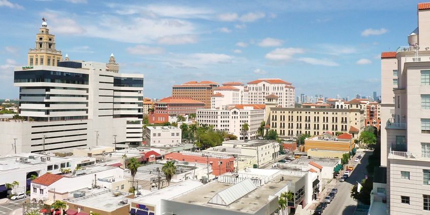 A view of Coral Gables, featuring charming streets and romantic dining options