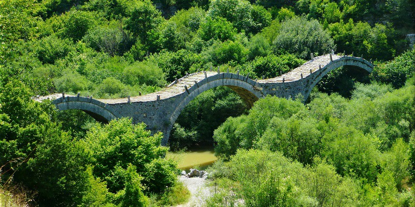 Explore a scenic stone bridge with your loved one to celebrate Valentine's Day in Greece.