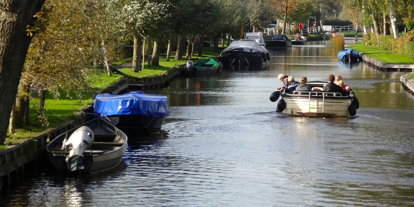 Scenic boat cruise along Amsterdam’s historic canal belt in the city of Amsterdam.
