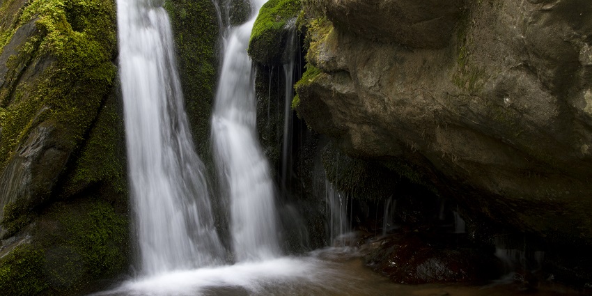 The image shows Dark Hollow Falls, amongst the best places to visit near the Shenandoah National Park.