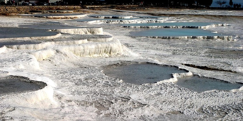 Rejuvenating springs with mineral waters, near ancient ruins.