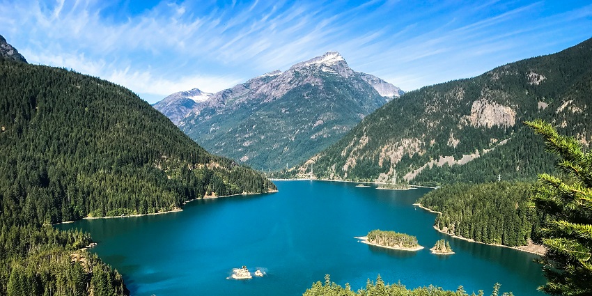 View of Diablo Lake near North Cascades National Park, surrounded by mountains.