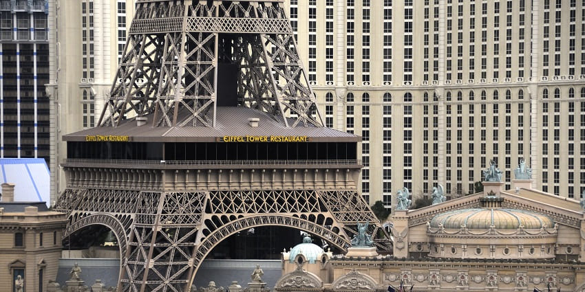Elegant dining experience on the Eiffel Tower with panoramic Paris, France views.