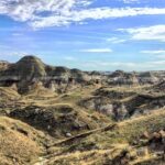 Panoramic view of Dinosaur National Monument, featuring rugged landscapes and distant mountains