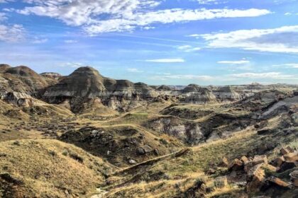 Panoramic view of Dinosaur National Monument, featuring rugged landscapes and distant mountains