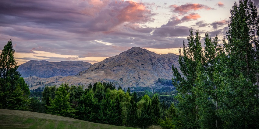Admire beautiful sunsets at Arrowtown, a charming historic gold mining town.