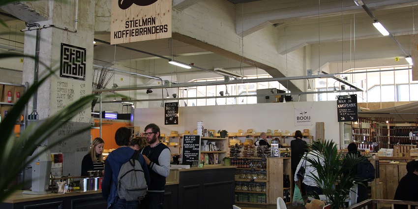 Trendy food market featuring local produce, restaurants, and artisan products