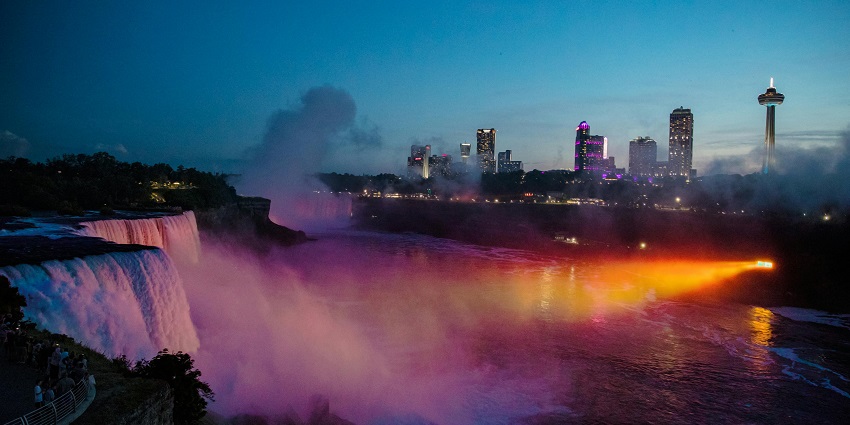 An illuminated Niagara Falls - one of the best things to do in Niagara Falls in March.