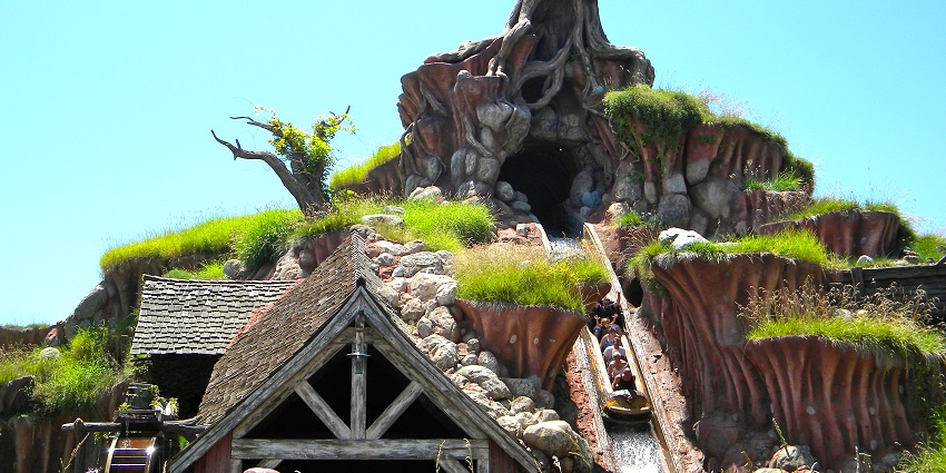 The Splash Mountain water ride at Disneyland shows some people riding on a water slide