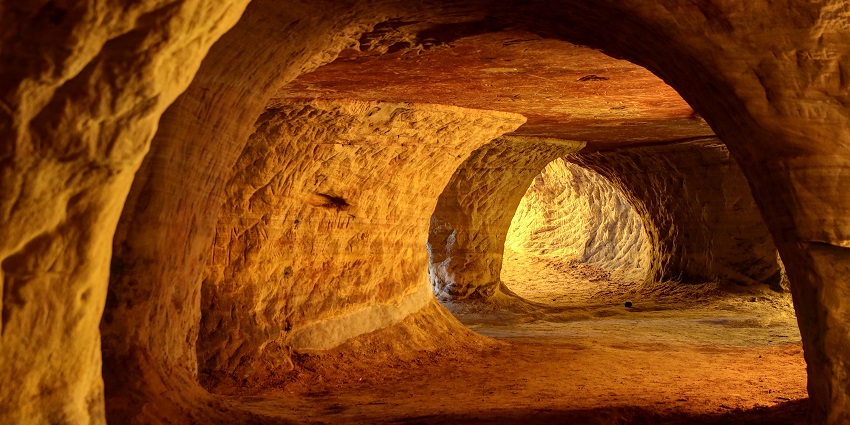 Two-level cave system with fascinating rock formations and hollow atmosphere
