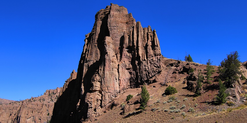 A panoramic view of a rock formation along the highway to the east entrance.