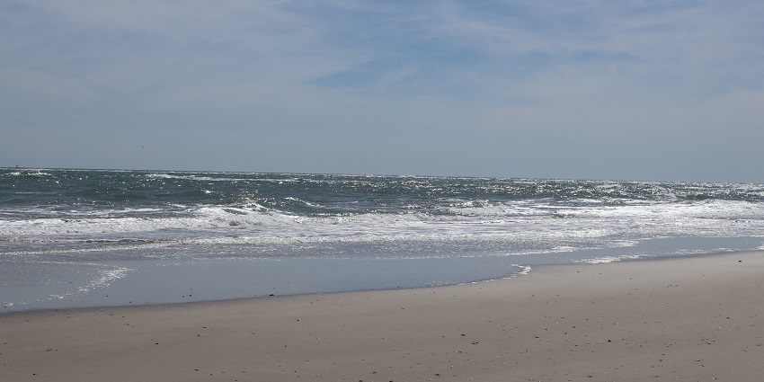 A view of a delightful sunrise over the ocean at one of the secluded beaches in North Carolina.