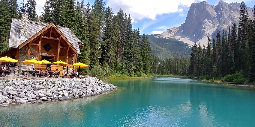 An image of the clear blue water of Emerald Lake, a popular destination near Yoho National Park in Canada.