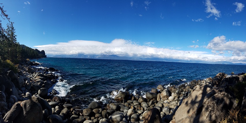 The view shows the east side of the Lake Tahoe with blue water in California, USA.