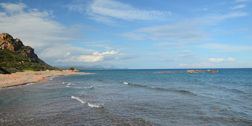 Relaxing beach with crystal-clear waters and stunning coastal views.