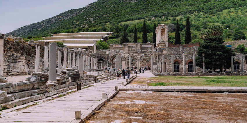 Ancient city featuring historical ruins like the Temple of Artemis.