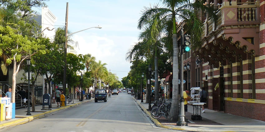 Vehicles throng less busy roads of Duval Street in Key West, Florida, USA