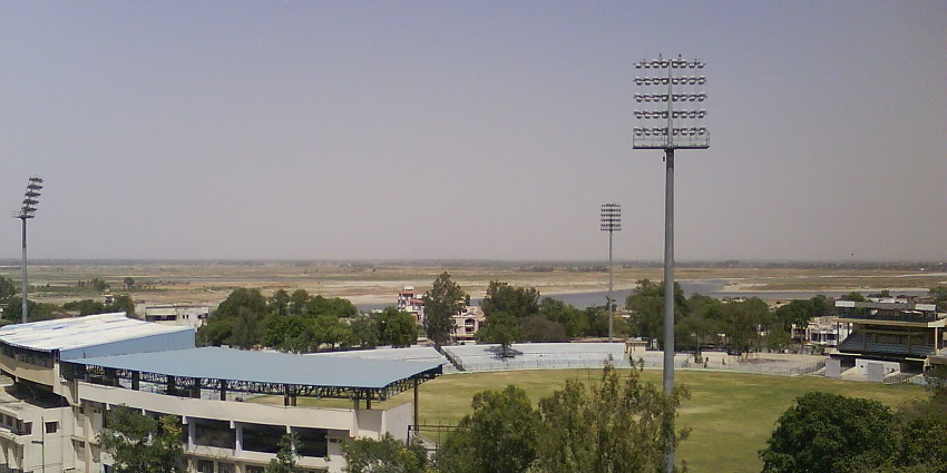 An image of Green Park Stadium in Kanpur with a large cricket ground and high-lighting towers