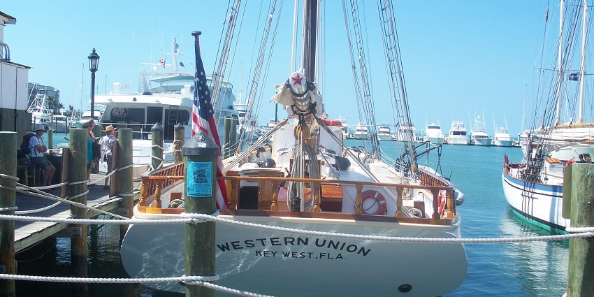 A boat named Western Union docked at Key West’s Historic Seaport in Florida, USA