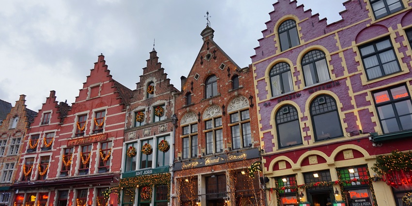 Things to do in Bruges include exploring this square surrounded by stunning architecture.