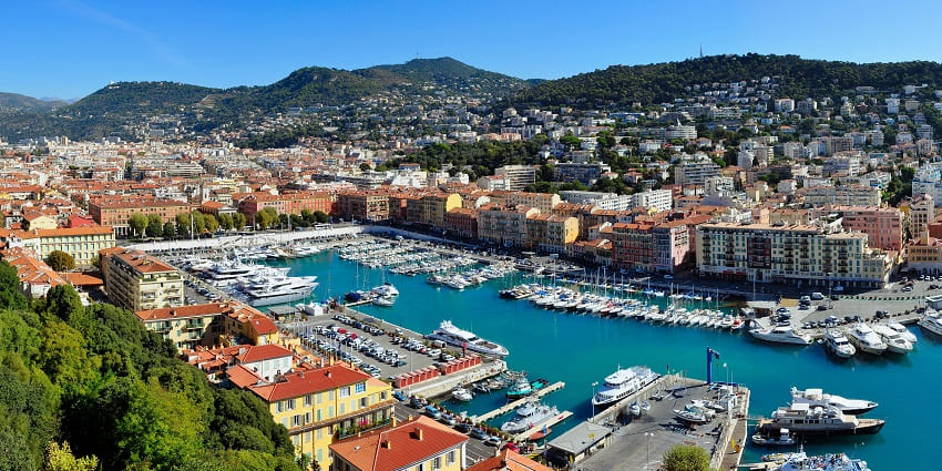 Things to do in Nice, France include exploring the narrow streets with colourful buildings and vibrant local culture.