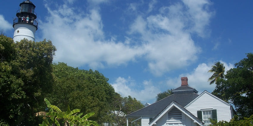 Visitors standing in front of the Keeper’s Quarters Museum in Key West, Florida