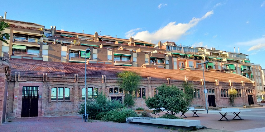 Fabrika 126 building with multiple windows, a place to enjoy vibrant Sofia nightlife.