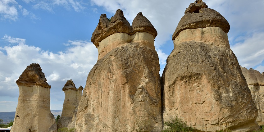 Places to visit in Cappadocia include the rock formations resembling towering spires
