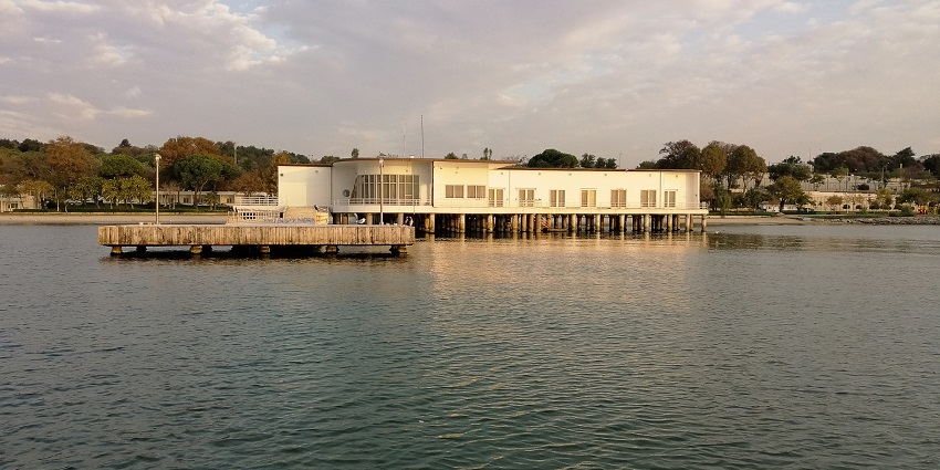 Family-friendly beach with sunbathing, swimming, and seaside cafes