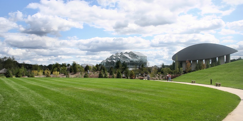 A view of Meijer Gardens, one of the top art galleries in Michigan, featuring a conservatory.