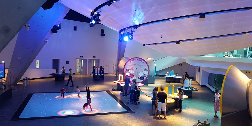 A view of children playing with light displays - one of the best places to visit in Miami.