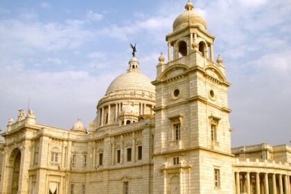 An image of a wondrous stone structure consisting of domes and spires in Kolkata.