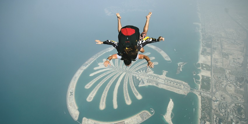 Skydiving in Paris, France with breathtaking views over scenic landscapes.