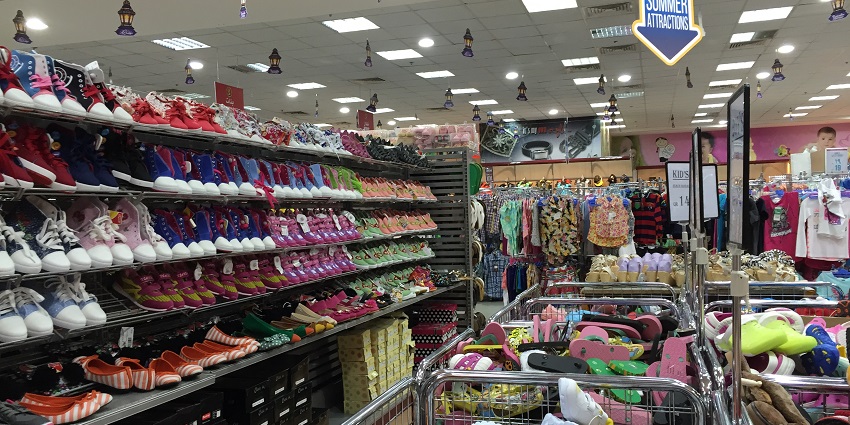 Expansive shopping mall offering luxury brands and entertainment options.