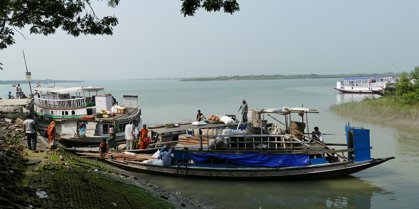 A picture of a river and ferry at Gosaba in the Sundarbans, showcasing the waterways.