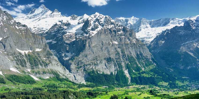 Vibrant village surrounded by iconic peaks, ideal for hiking and skiing.