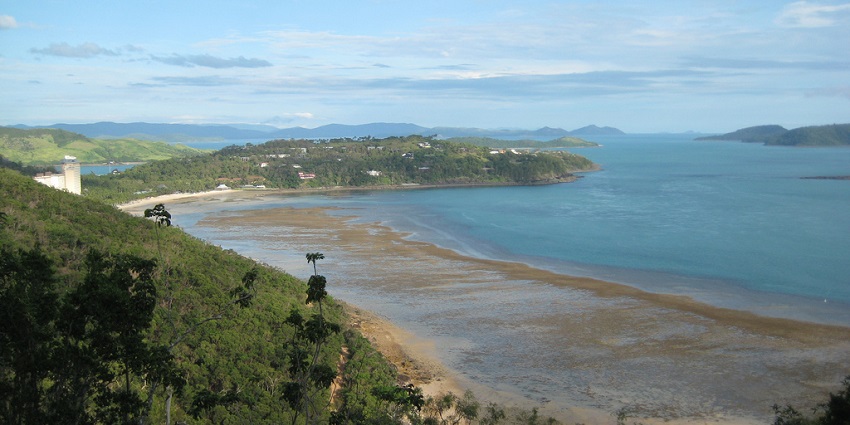 An aerial view of Hamilton island, one of the places to visit near Whitsunday Islands.