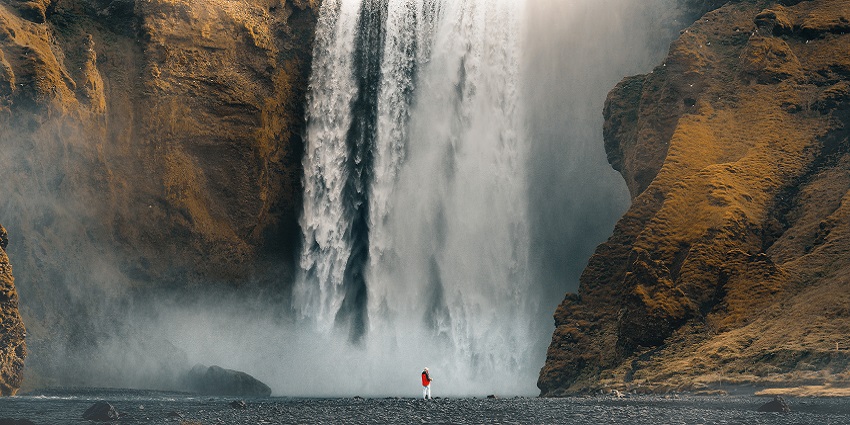 An image of Hanakapiai Waterfalls, which is one of the famous Kauai waterfalls.