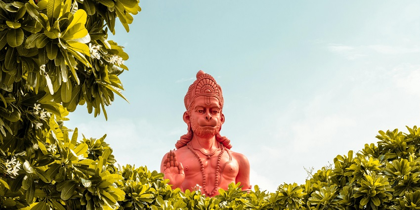 A statue of Lord Hanuman at Hanuman Dham, another prominent religious site.