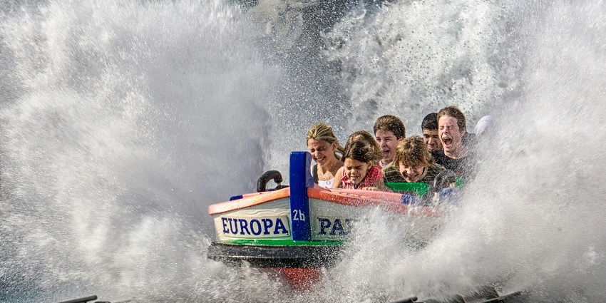 An image of guests experiencing exhilarating water rides at a water park in Lucknow.