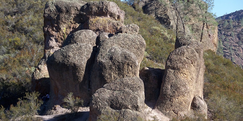 An image of High Peaks Trail with rugged mountains in Pinnacles National Park.