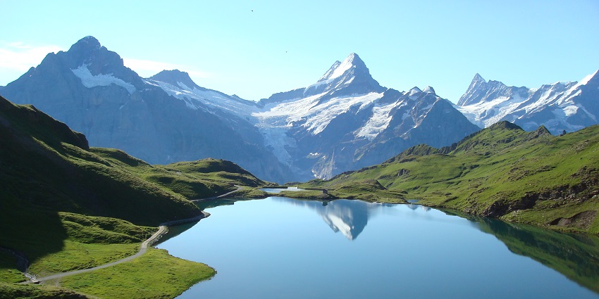 Things to do in Grindelwald include a hike leading to a crystal-clear mountain lake.