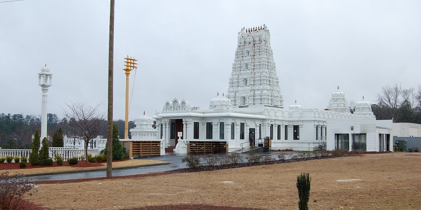An image of the Hindu Temple of Atlanta, a prominent Hindu temple in the USA with North and South Indian deity shrines.