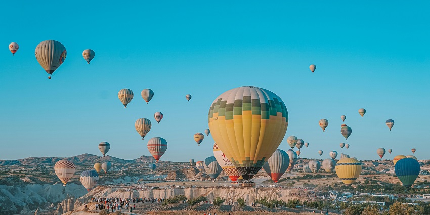 The hot-air balloon rides offer breathtaking views of Cappadocia’s fairy chimneys