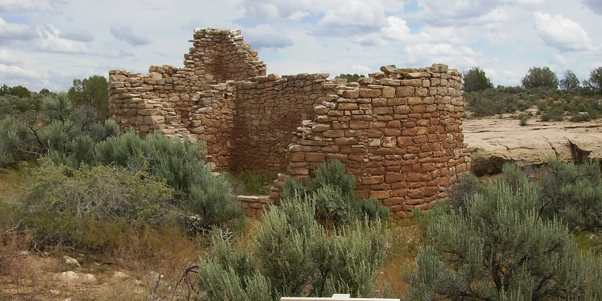Ancient stone structure at Hovenweep National Monument, showcasing native cliff dwellings.