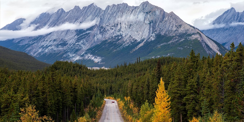 A picturesque landscape of Jasper National Park, featuring a river and mountains