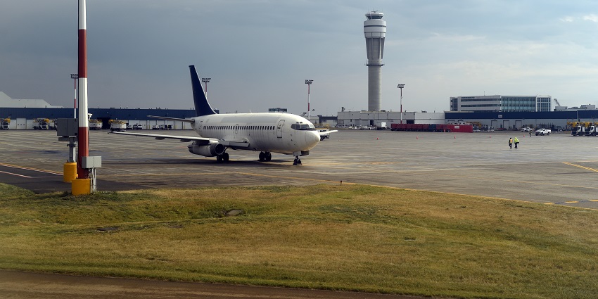 View of the Air Traffic Control (ATC) tower at Calgary Airport, with a clear blue sky