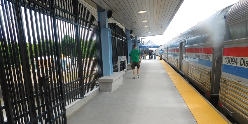 Amtrak platform at Niagara Falls, New York, with a view of the surrounding area.