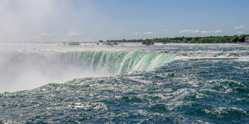 View of Horseshoe Falls from Table Rock Centre in Niagara Waterfalls, Ontario, mist rising high